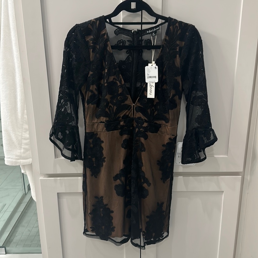 NWT for Love and Lemons gorgeous black dress with sheer and lace design